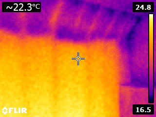 THERMAL IMAGE SHOWING HEAT LOSS THROUGH A FIRST FLOOR CEILING INTO THE ATTIC